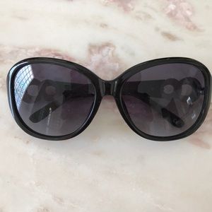 Stylish dark sunglasses with crystal stone